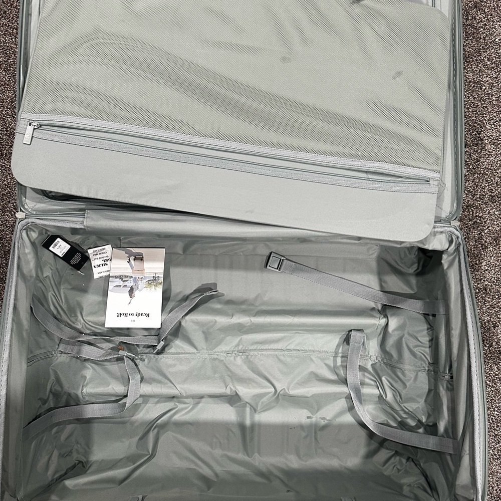 Slate blue Beis luggage in the size large!